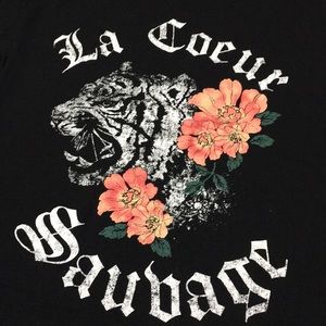 Black transparent-ish crop top with long backside